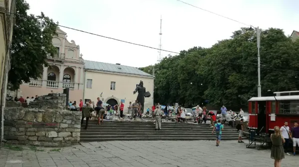 Market in front of Orthodox church of the Dormition of the Mother of God in Lviv